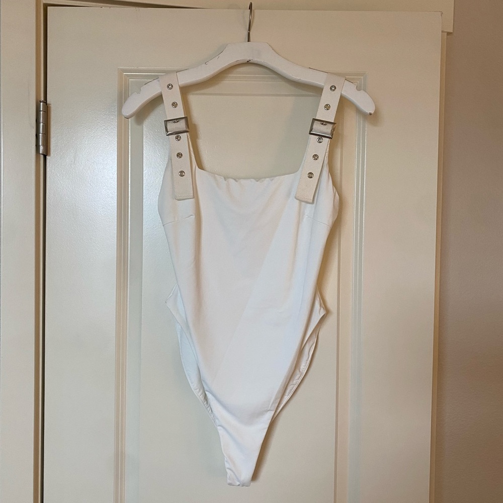 Tiger Mist Buckle Bodysuit. Size M. White. Double lined, athletic/stretchy.